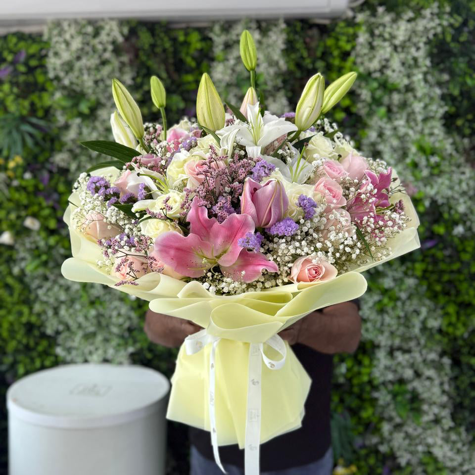 Sunset Splendor: Mix OF Roses Lilies